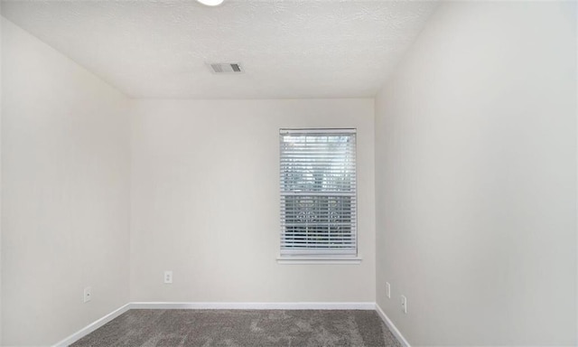 2960 Fields Dr, Lithonia, GA 30038 - carpeted spare room featuring baseboards and a textured ceiling