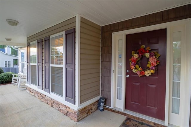 entrance to property with covered porch