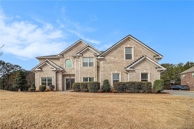 view of front of home with a front yard