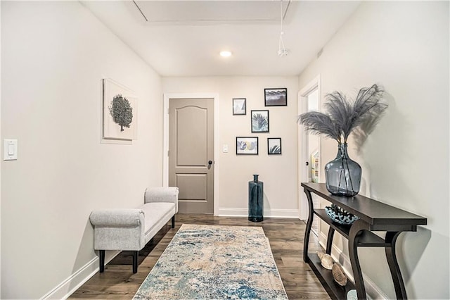 home office with dark hardwood / wood-style flooring