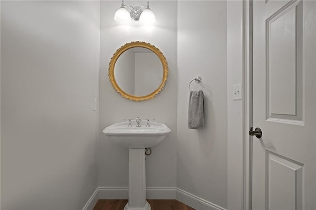 bathroom featuring hardwood / wood-style flooring