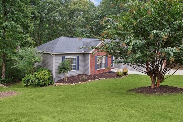 view of front of home with a front yard