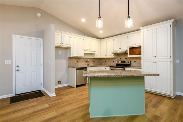 3105 The Trail Rd, Gainesville, GA 30501 - kitchen with appliances with stainless steel finishes, vaulted ceiling, white cabinetry, backsplash, and recessed lighting