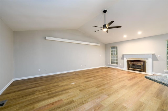 3105 The Trail Rd, Gainesville, GA 30501 - unfurnished living room with a ceiling fan, a fireplace, wood finished floors, and lofted ceiling