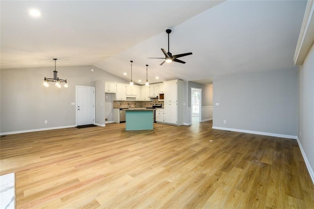 3105 The Trail Rd, Gainesville, GA 30501 - unfurnished living room featuring ceiling fan, lofted ceiling, a chandelier, light wood-style floors, and recessed lighting