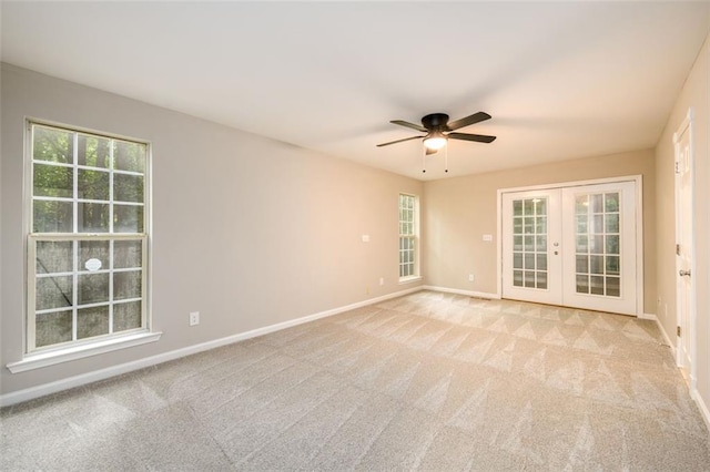 3105 The Trail Rd, Gainesville, GA 30501 - empty room featuring french doors, a ceiling fan, light colored carpet, and plenty of natural light