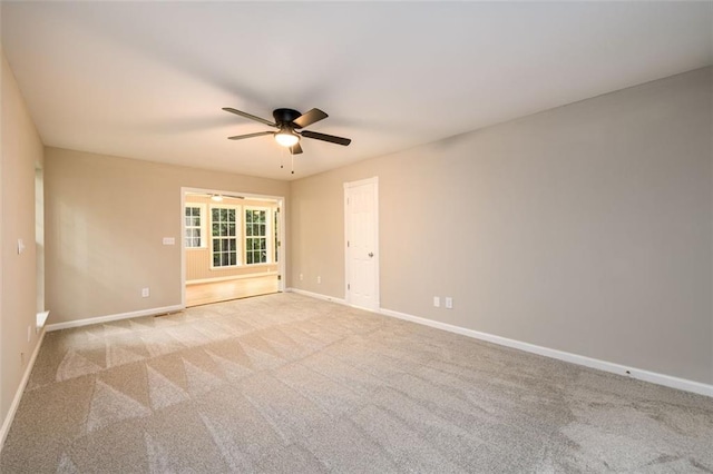 3105 The Trail Rd, Gainesville, GA 30501 - spare room with a ceiling fan and light colored carpet