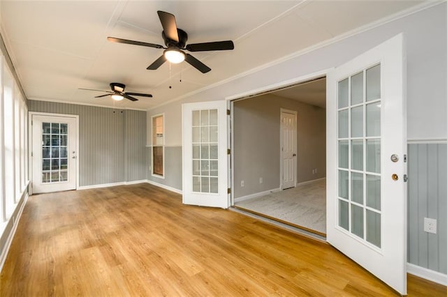 3105 The Trail Rd, Gainesville, GA 30501 - empty room featuring french doors, light wood-type flooring, a ceiling fan, and ornamental molding