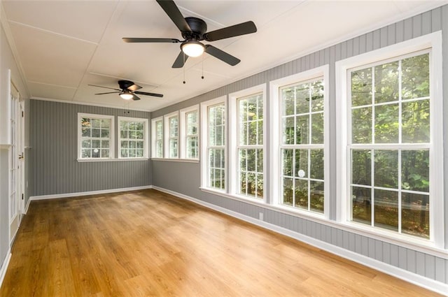 3105 The Trail Rd, Gainesville, GA 30501 - unfurnished sunroom with plenty of natural light, wood finished floors, and crown molding