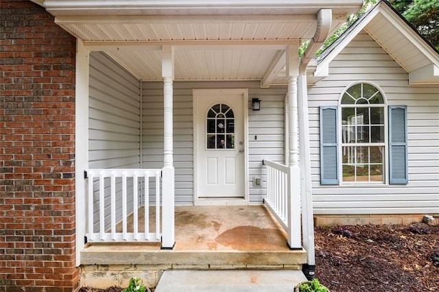 3105 The Trail Rd, Gainesville, GA 30501 - view of exterior entry featuring covered porch and brick siding