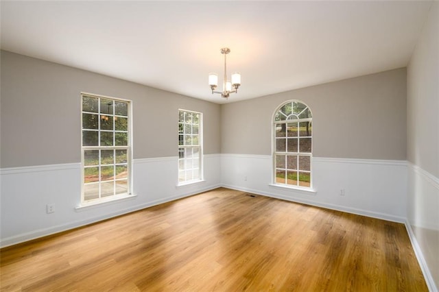 3105 The Trail Rd, Gainesville, GA 30501 - spare room featuring a chandelier and light wood finished floors