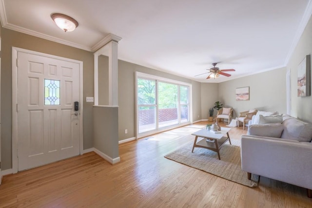 2279 Parkview Cir, College Park, GA 30337 - foyer entrance featuring wood finished floors, ornamental molding, a ceiling fan, and baseboards