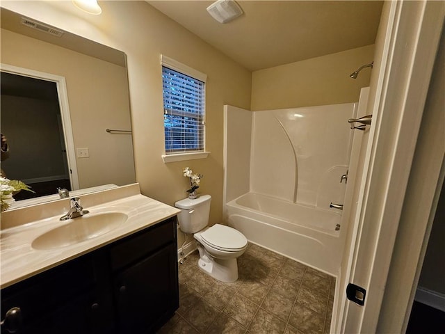 full bathroom with vanity, shower / bathtub combination, and toilet