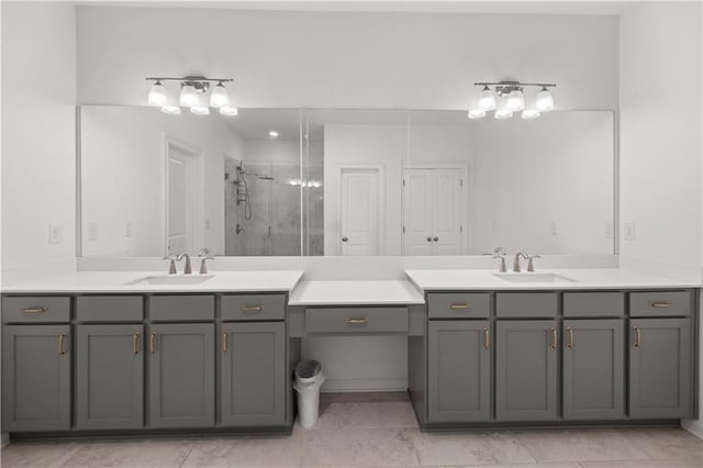 bathroom featuring vanity and a shower with shower door