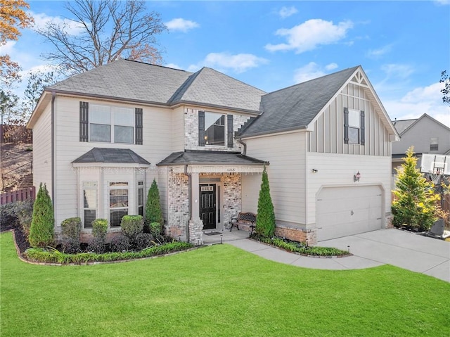 view of front facade featuring a front lawn and a garage