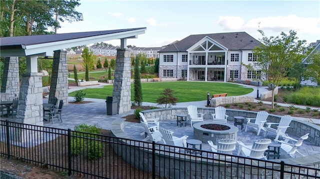 view of patio / terrace with an outdoor fire pit