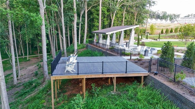 view of community with a wooden deck