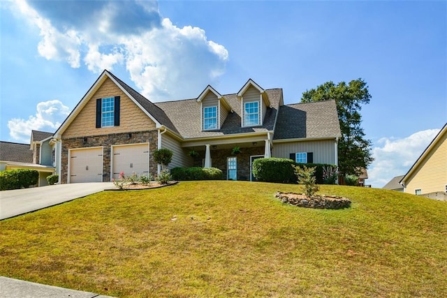 view of front facade featuring a garage and a front lawn