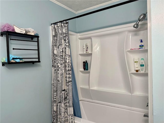 bathroom with crown molding and shower / bath combo