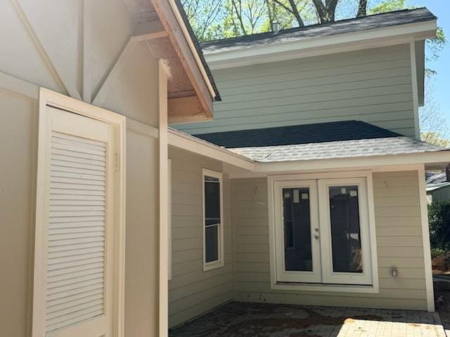 6405 Cherry Tree Ln, Atlanta, GA 30328 - exterior space with french doors and roof with shingles