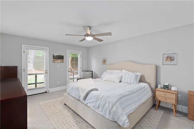 1217 Club Walk Dr NE, Brookhaven, GA 30319 - bedroom featuring carpet flooring, access to exterior, a ceiling fan, and baseboards