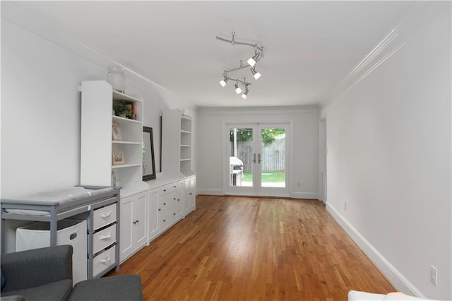 1217 Club Walk Dr NE, Brookhaven, GA 30319 - unfurnished living room with french doors, light wood finished floors, ornamental molding, and baseboards