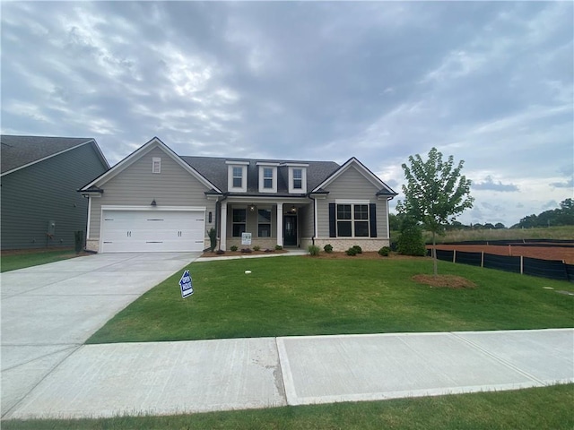 216 Montview Dr, Jefferson, GA 30549 - view of front of property featuring a garage, concrete driveway, and a porch