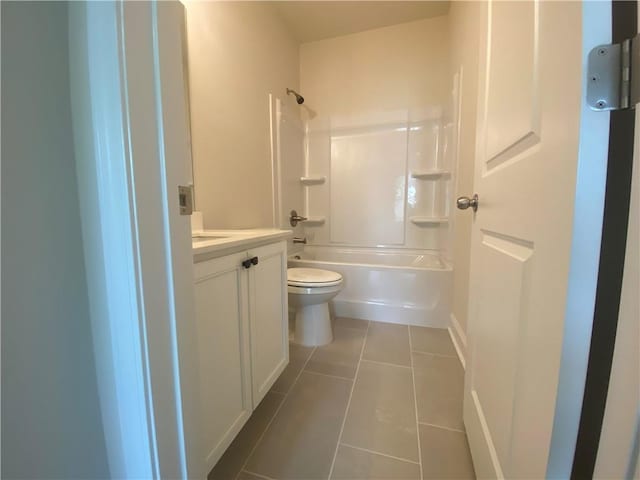 216 Montview Dr, Jefferson, GA 30549 - bathroom featuring tile patterned flooring, toilet, vanity, shower / bathtub combination, and baseboards