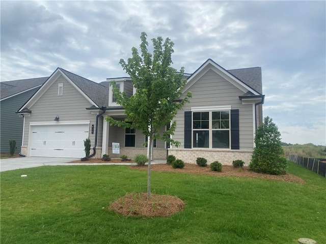 216 Montview Dr, Jefferson, GA 30549 - view of front facade with a front yard, concrete driveway, an attached garage, and a shingled roof
