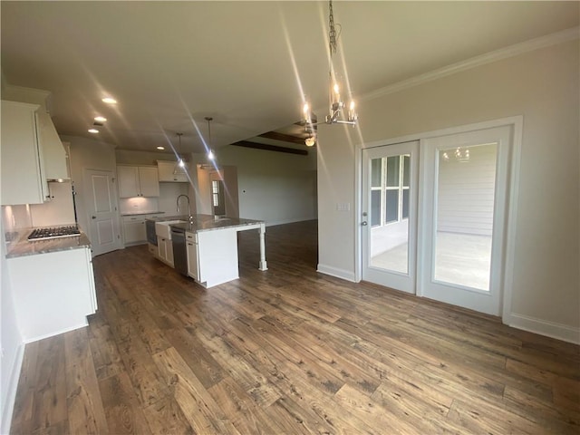 216 Montview Dr, Jefferson, GA 30549 - kitchen featuring a sink, stainless steel appliances, white cabinetry, crown molding, and dark wood finished floors