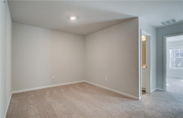 8147 Tiger Way, Riverdale, GA 30296 - empty room with light carpet and baseboards