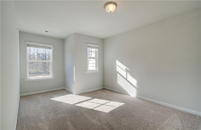 8147 Tiger Way, Riverdale, GA 30296 - empty room with light colored carpet and baseboards