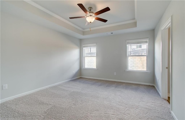 8147 Tiger Way, Riverdale, GA 30296 - unfurnished room with ornamental molding, carpet, a ceiling fan, a raised ceiling, and baseboards