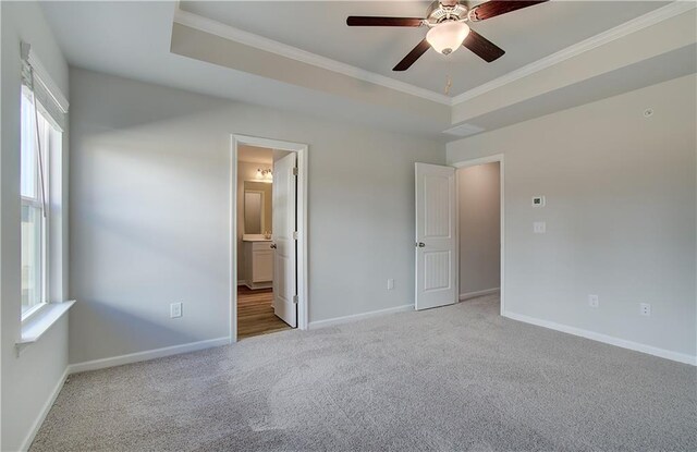 8147 Tiger Way, Riverdale, GA 30296 - unfurnished bedroom featuring carpet flooring, ornamental molding, multiple windows, and baseboards