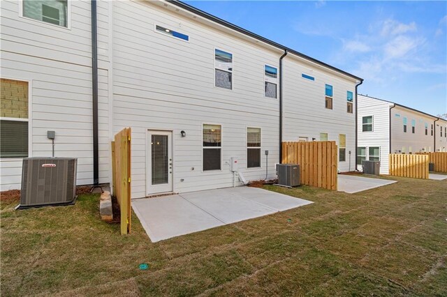 8147 Tiger Way, Riverdale, GA 30296 - back of property featuring a patio and central AC
