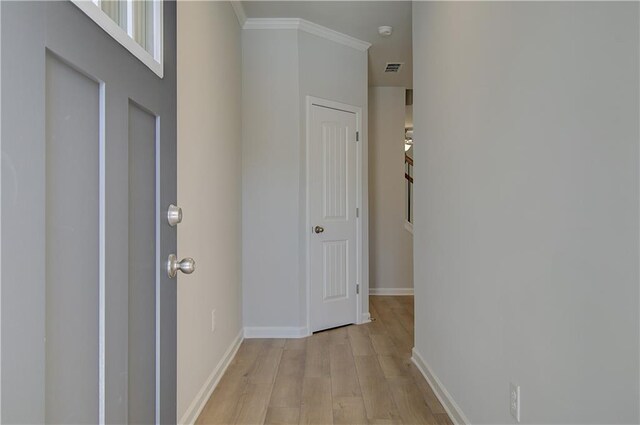 8147 Tiger Way, Riverdale, GA 30296 - hall featuring light wood-style flooring, ornamental molding, and baseboards