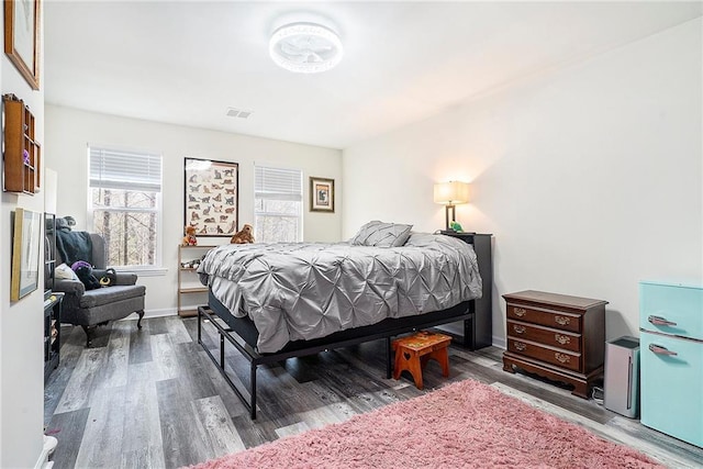 bedroom featuring wood-type flooring