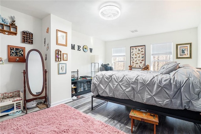 bedroom with hardwood / wood-style floors