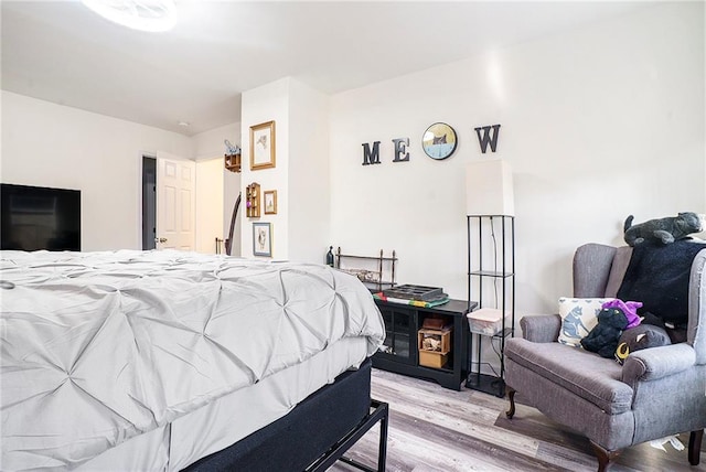 bedroom with light hardwood / wood-style floors