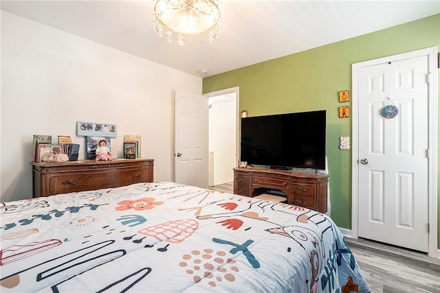 bedroom with light hardwood / wood-style flooring