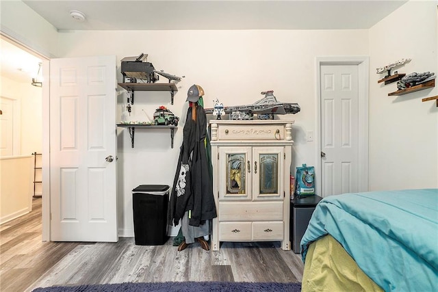 bedroom featuring hardwood / wood-style floors