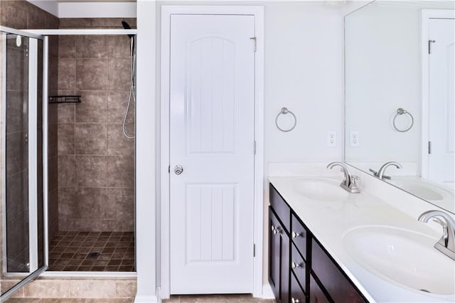 bathroom featuring vanity and walk in shower