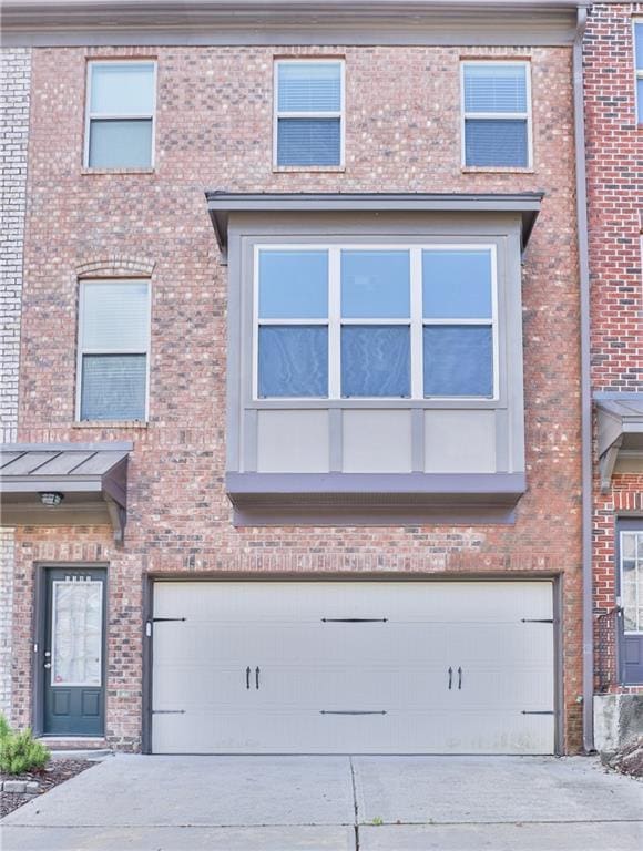 view of property with a garage