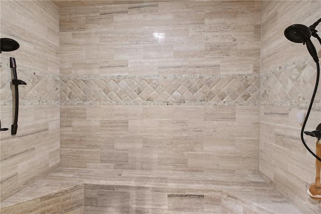 details with a tile shower