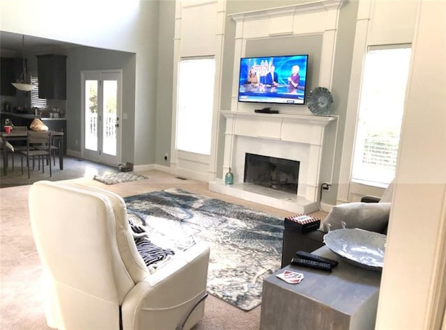 6265 Lake Windsor Pkwy, Buford, GA 30518 - carpeted living room with plenty of natural light and a high end fireplace