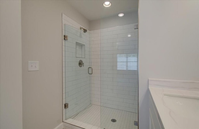 3338 Cranston Ln, Kennesaw, GA 30144 - bathroom with a stall shower, recessed lighting, and vanity