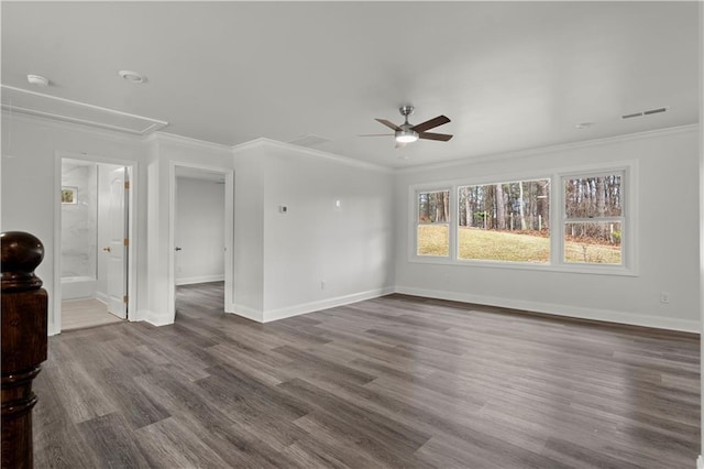 unfurnished living room featuring a ceiling fan, baseboards, visible vents, and attic access