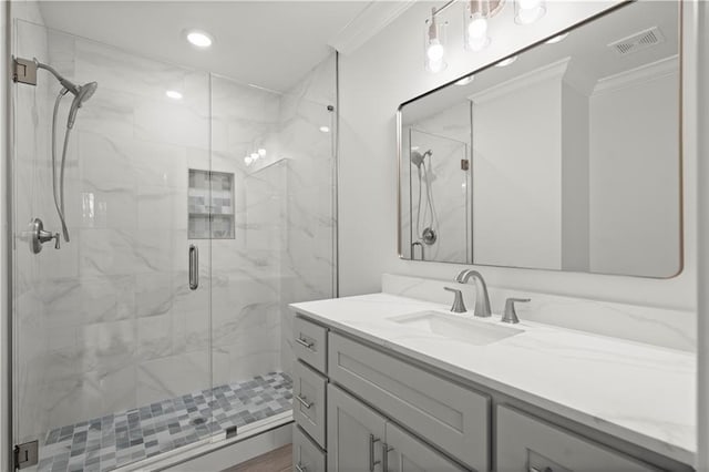 full bathroom with visible vents, crown molding, vanity, recessed lighting, and a marble finish shower