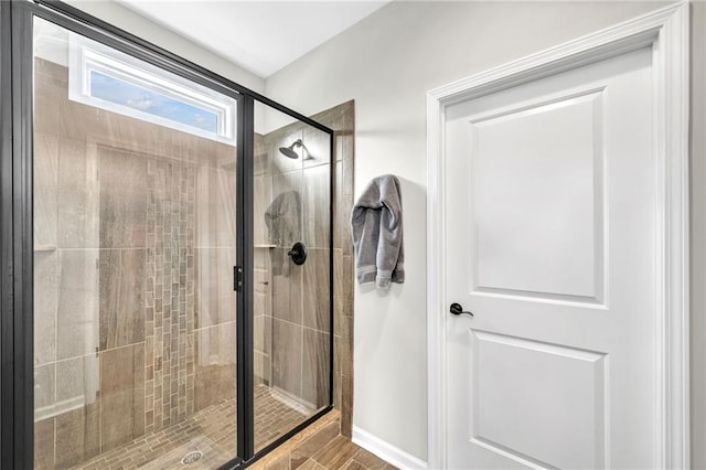 bathroom featuring an enclosed shower