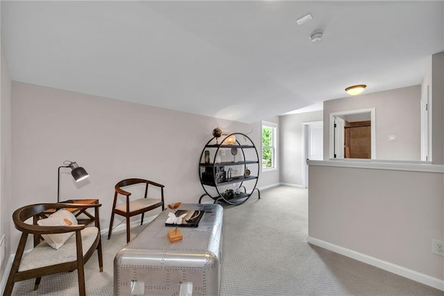 sitting room with light carpet